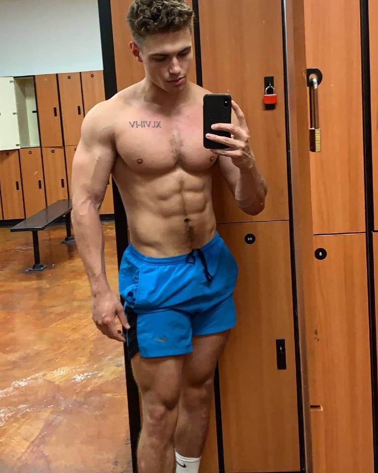 Colton Wergin taking a selfie in a gym locer room